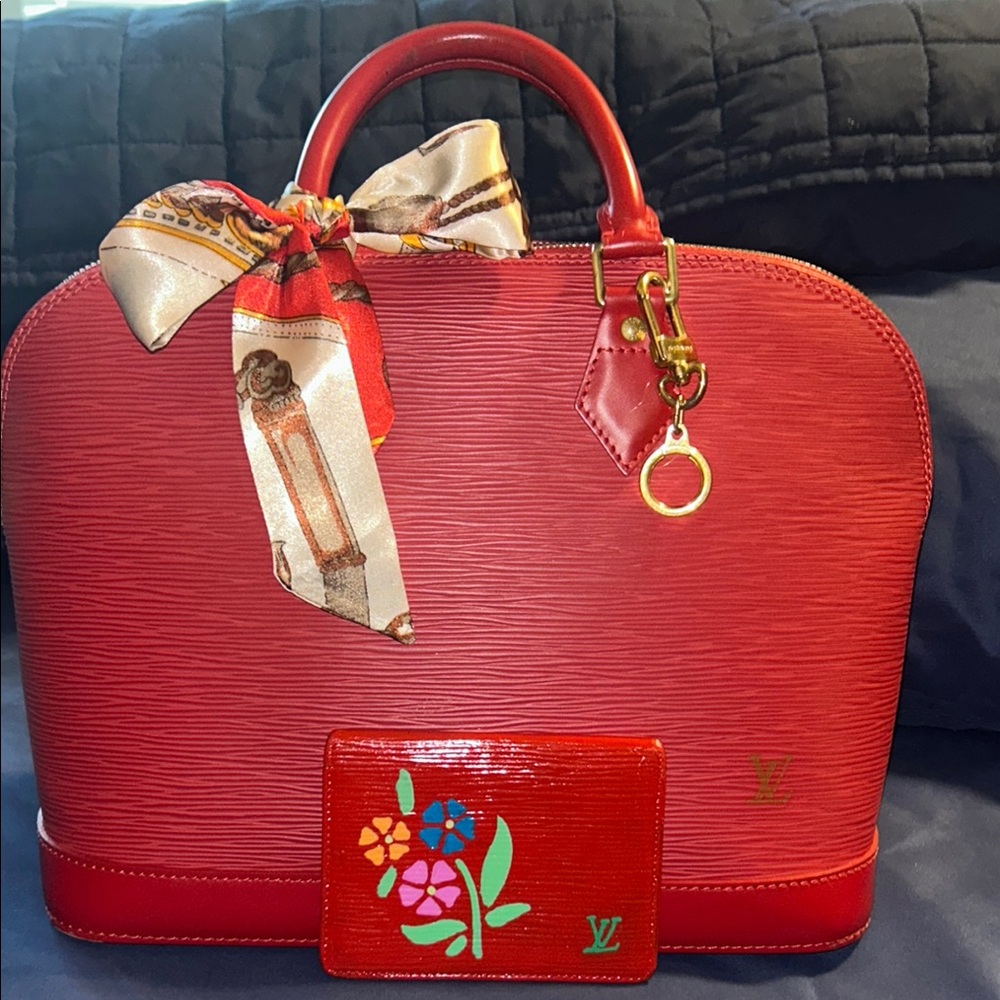 Elegant Louis Vuitton Epi Red Alma Handbag Excellent Condition